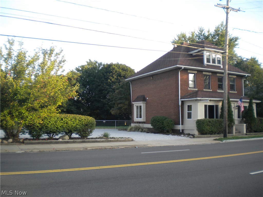 Currently used as two family. See city for zoning and possible uses. Past uses are two family,beauty shop,office . Solid tenants in both units paying 500.00 and 545.00 plus gas and electric. Fantastic curb appeal and quality. Large parking lot to go with sale! newer furnace and 12k new roof completed last month.