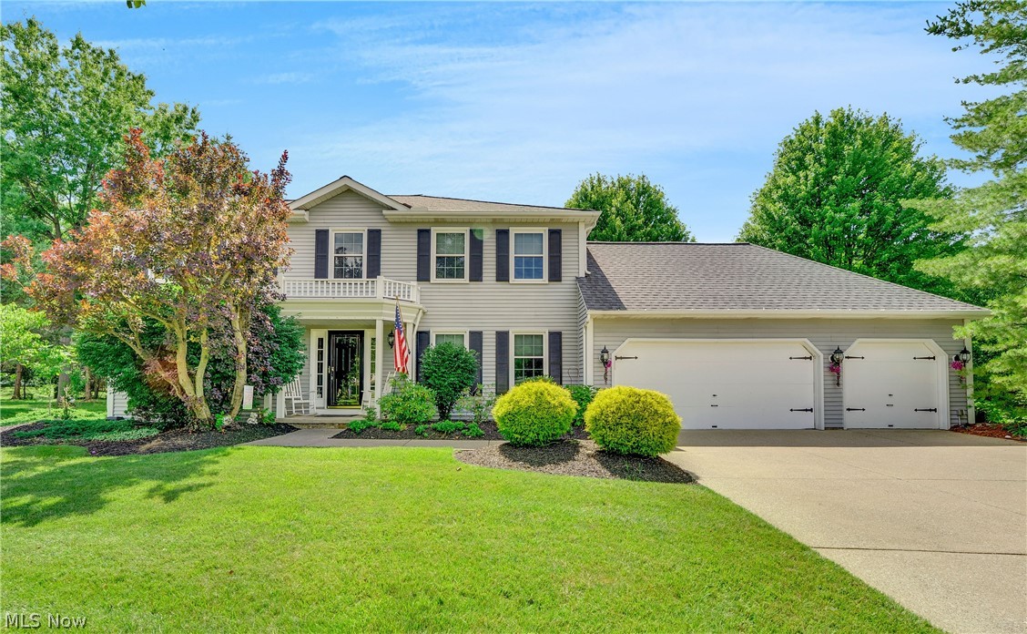 Welcome to 7660 Acorn Court — one of just five homes nestled on a private, treed cul-de-sac in one of Solon's most sought-after settings. From the moment you arrive, the location speaks for itself: a quiet, low-traffic street with a beautifully wooded backdrop and an oversized private backyard that is truly hard to find. Step inside and you're greeted by a dramatic two-story foyer that sets the tone for the rest of the home, opening naturally into the living room and dining room. New luxury vinyl plank flooring runs throughout the kitchen, living, dining, family room, and first-floor office, giving the main level a fresh, cohesive feel. The updated cherry kitchen offers modern finishes and materials and flows seamlessly into the heart of the home. The family room is a showstopper — massive in scale with a soaring cathedral ceiling, a wood-burning fireplace with gas logs, and plenty of room for everyone to gather. Just off the main living area, the covered screened porch is a true retreat. Featuring a cathedral ceiling with skylights, this private space looks out over the expansive deck and lush backyard, perfect for morning coffee or evening entertaining. The first floor also includes a fifth bedroom or home office, a spacious laundry and mud room, and easy access to the three-car garage. Upstairs, the oversized primary suite impresses with a tray ceiling, walk-in closet, double vanities, a jetted tub, and a separate shower. Three additional generous bedrooms and a full bath round out the second floor. The finished lower level adds even more living space with three separate rec room areas and a third full bath — ideal for a home gym, playroom, theater, or hobby space. This is a rare Solon opportunity with the space, setting, and updates today's buyers are looking for.