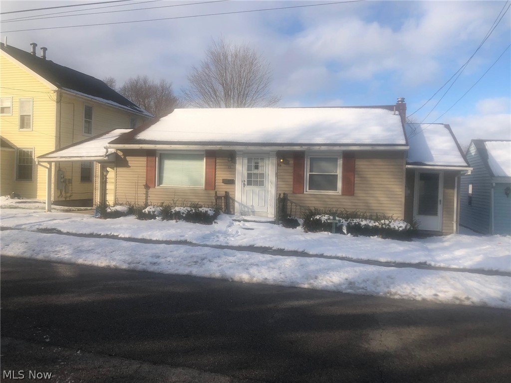 Two-bedroom, one-bath ranch home in the heart of Columbiana, has eat-in kitchen, enclosed porch, full basement, one-car attached garage. Fixer-upper, price reflective of current condition.