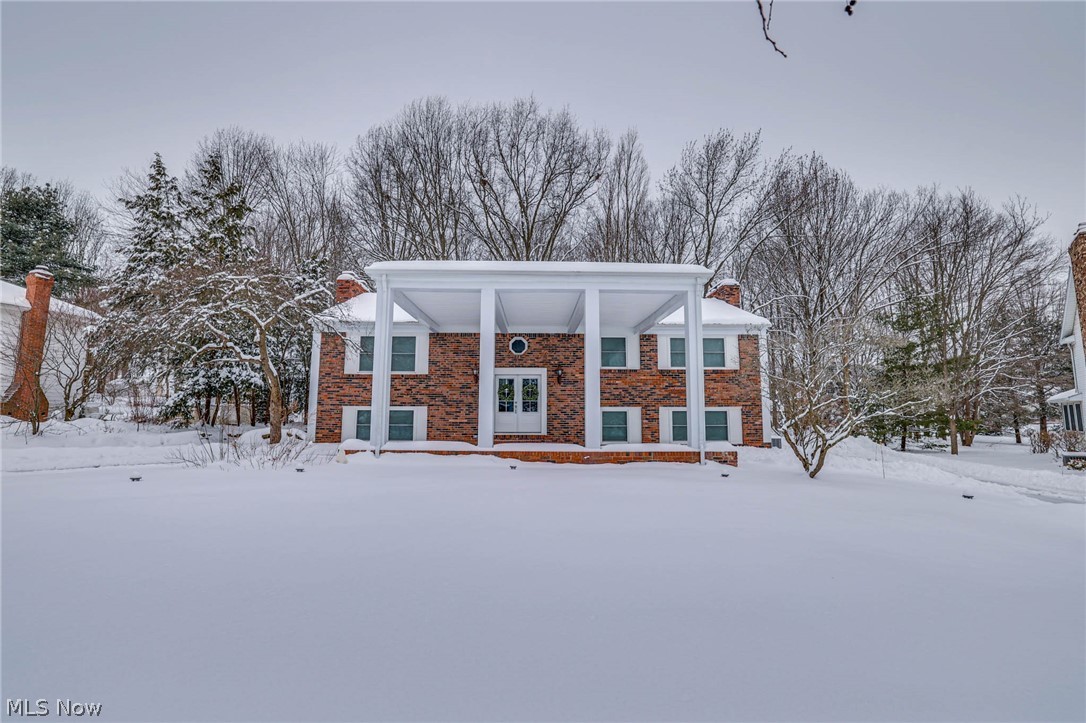 Talk about curb appeal! This charming home sits on over a half acre of land in Prestwick Estates. Complete interior remodel in 2020, including a new electric panel, AC, water tank, floors, carpet, and fresh paint. As soon as you walk through the front door and up the stairs, you are greeted with an open floor plan, windows galore giving you tons of natural light, and a stunning kitchen making it the perfect place to entertain. This move-in-ready home offers 4 bedrooms, 3 bathrooms, and around 2476 sq ft of gorgeous updates. Updates include granite countertops, white shaker cabinets, new stainless steel appliances, and a subway tile backsplash. There are also new windows and window treatments (2020). Downstairs offers another bedroom, half bath, a full laundry room and a large rec room with an awesome white-washed brick fireplace. Beautiful wooded view, especially enjoyable from the 3-season shiplap room off the master bedroom. All stainless steel appliances included, plus washer and dr