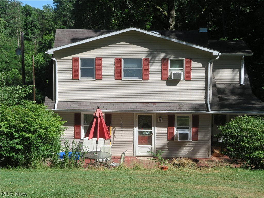 Cozy 3 BR., 2 bath farm house tucked into almost 14 acres of beautiful Carroll County.  Natural walnut hardwood floors in L.R. & D.R.  Kitchen recently upgraded with new ceramic tile flooring, paint, and all new appliances. Main floor bath recently remodeled, adding a washer/dryer to main floor. The upstairs has three bedrooms and a full bath. The property has a large, classic wooden barn with two-three stalls leading to newer three strand tensile fencing.  There is also a chicken coop, an equipment shed, a newer “ Weaver” barn and a detached 2 stall garage. The sprawling tree filled yard has a grape arbor, black raspberries, asparagus, and black walnuts. The spring time comes alive here with hundred of daffodils an other perennials. The paved driveway area is highlighted with beautiful rock wall areas. Very peaceful, quiet area, yet close to SR. 39. Two heat sources, fuel oil and/or wood burner.   Brand new water well, as we switched from spring water. Only second family to live & lov