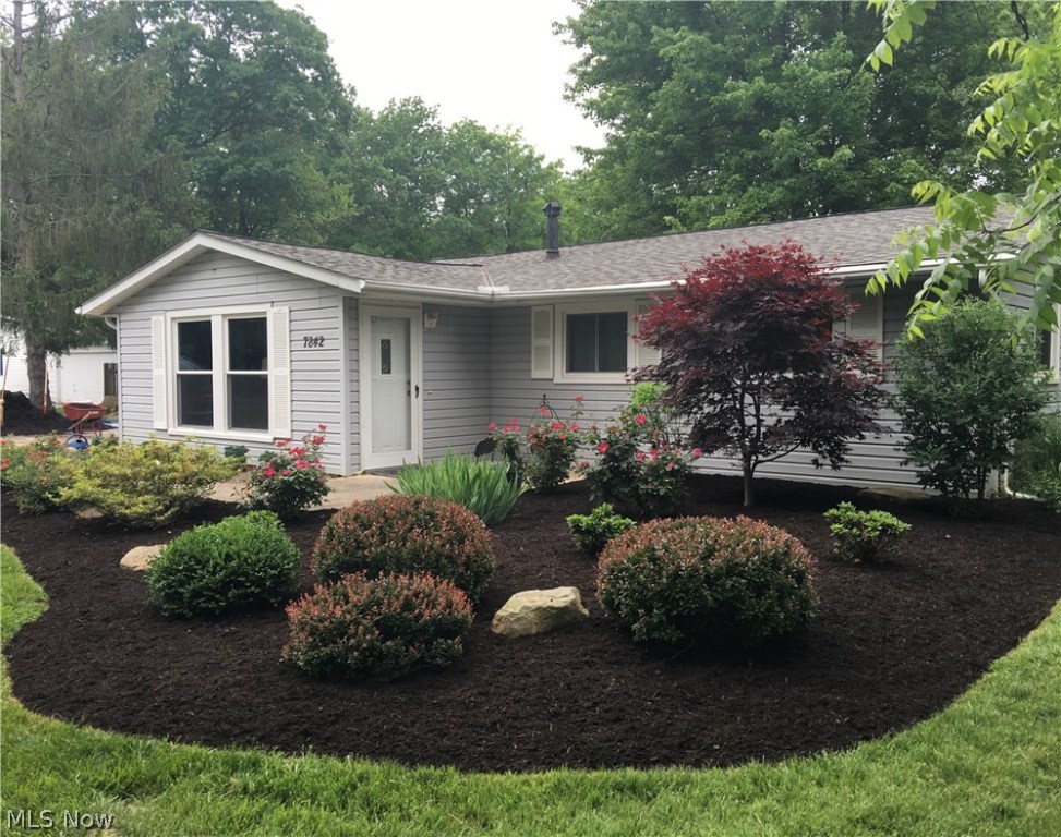 Welcome to this beautiful ranch on a quiet dead end street, close to many amenities; parks, shopping, restaurants, and access to I-480,  I-271, and State Route 8! This lovely 4 bedroom, 1 1/2 bath ranch includes an attached 2 1/2 car heated garage. For extra storage, there are built-in cabinets and shelving. As you walk into the foyer of this home, you are welcomed with a fully updated interior w/neutral and pleasing colors. In the past two years new carpet was installed, new paint through-out, new trim (including crown molding in living room, hall & master bedroom), and all new hardware, including new door locks. The kitchen is completely updated with new maple cabinets, counter top w/tile accent, flooring, range/oven, M/W oven, and D/W. Both bathrooms have porcelain tile floors, and there is porcelain tile surrounding the tub/shower in the main bath. The main bath also boasts a new Merillat vanity (w/cultured marble top), medicine cabinet, and new fan/light overhead. All windows were
