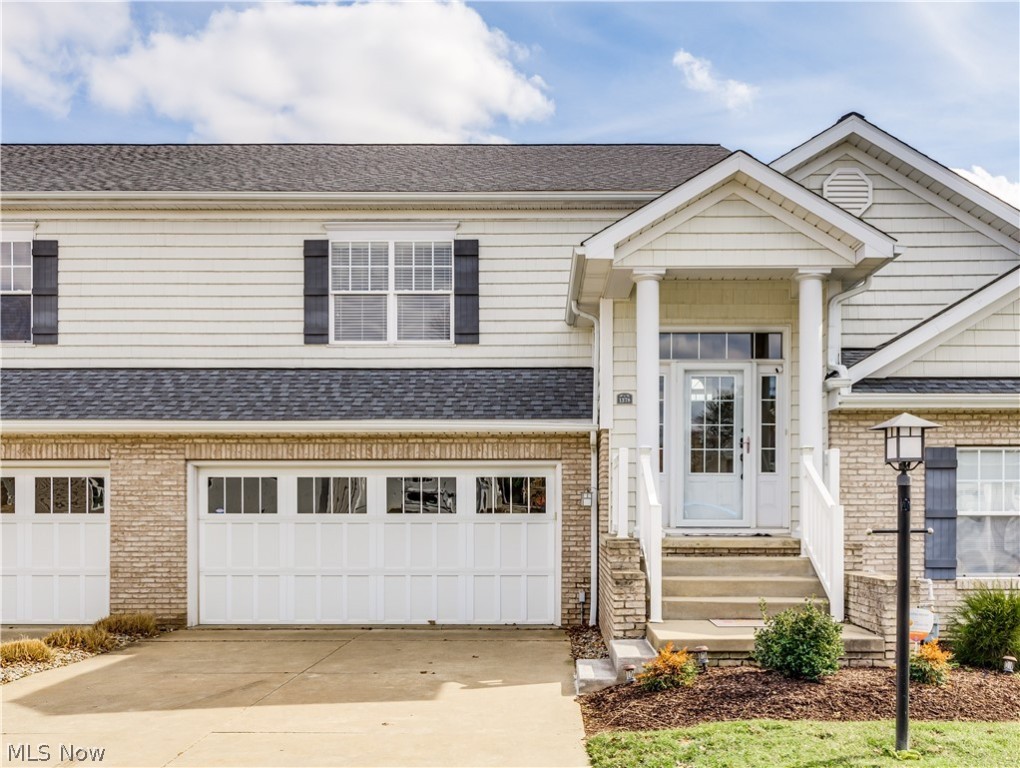 Tree top level living with picturesque view of pond.  Open concept plan with cathedral ceiling great room with fireplace and awash with natural light.  Kitchen features upgraded cabinets, breakfast bat, pantry, abundant counter space.  Sunroom overlooks the pond and egresses to the deck.  Split bedroom layout - master bedroom boasts cathedral ceiling, large walk-in closet with built-ins, spacious master bath with tub, showing and dual sinks; the guest bedroom offers privacy, walk-in closet and adjacent full bathroom.  The laundry room is conveniently located, the main floor provides 2 large storage closets.  Foyer entry at street level and garage level entry with storage area.  Community clubhouse with spacious gathering/entertaining area, dining area, partial kitchen and pool room, Separate exercise area and restrooms.  Access to Meyers Lake docks available with fee.