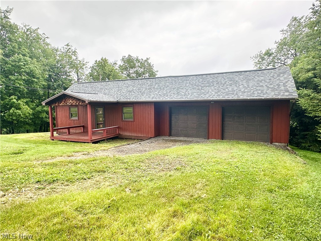 Peaceful Country Living on 1 Acre! Escape the hustle and enjoy the tranquility of country living in this charming 2-bedroom ranch nestled on a beautiful 1-acre lot. Surrounded by nature, this inviting home features a comfortable living room, a cozy dining area, functional kitchen, and full bathroom, offering a practical layout that's perfect for everyday living. Step outside onto the large back deck, where you can relax with your morning coffee, entertain family and friends, or simply take in the peaceful wooded views and abundant wildlife. A large attached 2-car garage provides plenty of space for vehicles, storage, or hobbies. If you've been searching for a quiet country retreat with room to breathe, this delightful property is ready to welcome you home!