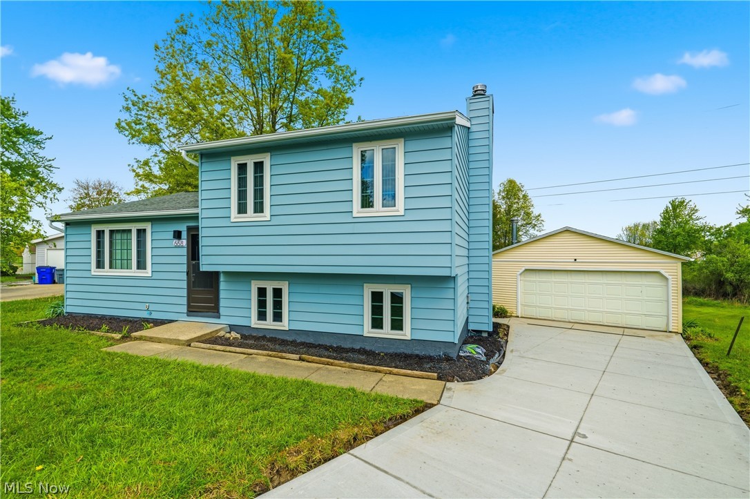 This beautifully remodeled 3-level split boasts a bright, open floor plan in a highly desirable neighborhood! Nestled on a spectacular, private cul-de-sac lot, the property adjoins a peaceful green space with a gorgeous tree-lined perimeter.

The moment you step into the foyer, the airy, open flow of this fully renovated home will wow you. From the entry, step into the expansive living room, featuring a massive picture window that floods the space with natural light. The elegant formal dining room, complete with a stylish ceiling fan and light fixture, sits just off the living room. French doors lead out to an oversized, updated deck—perfect for outdoor entertaining. The dining space flows seamlessly into the stunning, fully updated eat-in kitchen, which offers abundant cabinet space, gorgeous new granite countertops, and brand-new 2026 appliances (refrigerator, oven, microwave, and dishwasher).

Upstairs, you will find three generously sized bedrooms, including one that overlooks the private backyard. All bedrooms are just steps from the pristine full bath, featuring a classic tub and shower combo. Each room has been refreshed with brand-new carpet and modern paint (2026), making it entirely move-in ready.

Rounding out this incredible opportunity is the walk-out lower level, featuring a dedicated platform ready for a large wood-burning fireplace, a convenient and fully remodeled half bath, and a separate laundry room with the washer and dryer included.

Additional Features Include:
Brand-new HVAC system (2026 furnace, central air unit, and hot water tank)
Full concrete crawl space under the entire first floor for excellent storage
Rare and spacious 2-car garage
Updated windows throughout
Fully fenced backyard with a brand-new 2026 privacy fence
Brand-new 2026 concrete driveway ready for your vehicles

This home truly has it all! Schedule your private showing today and see this turnkey beauty for yourself.
