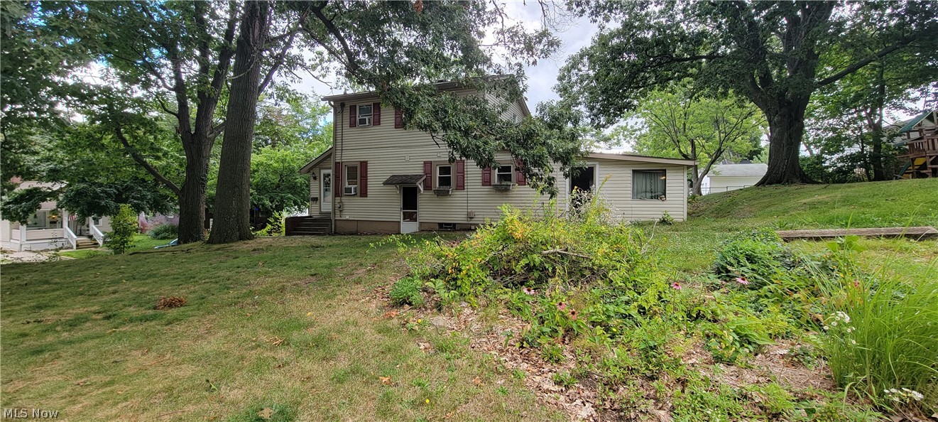 New bank approved price! Affordable 3 bedroom home with a lot to offer! Inside you'll see a kitchen with ample cabinet and counter space, formal dining area and living room. The main floor bedroom could double as a home office space and that option is also available in the basement. Basement, also has a 1/2 bathroom and plenty of storage area. Radon mitigation system in place. Enclosed front porch to enjoy a morning cup of coffee. Nice vinyl siding and replacement windows. Do you love to entertain? Imagine hosting cookouts on your deck or in the screened in porch, complete with hot tub. Located on a spacious lot with a nice usable yard. 2 car garage for parking with a workshop for your hobbies. A little TLC will go a long way here! Schedule your showing​​‌​​​​‌​‌​​​‌‌​​​‌‌‌​​‌​​‌‌​​​​ today!