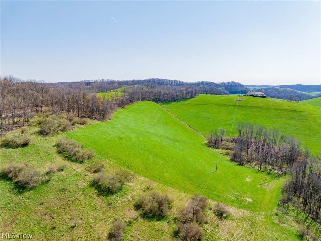 Live Auction 5/27/2026 6:00 PM - Parcel 3: 12.8 +/- Acres w/ dedicated private drive - A beautiful country property set northeast of Stone Creek with rolling hills and a quality ranch home offering some of the most scenic hilltop views in the county. The ranch home features an open layout on the main floor, with a 2-car attached garage, a large kitchen and living room, large dining area, a full bathroom, two bedrooms, one with an en-suite bathroom, and the primary suite with two walk-in closets and a large en-suite bathroom. Don’t miss the 24x30 deck and the scenery it provides. The basement is partially finished, with walk-out access, it provides ample storage space, a half bath, a bedroom, and possibility for two more bedrooms. Utilities to the home include free gas forced air heat, central air, private well & septic. The land is full of opportunity, with parcels ranging in size from 6.5 to 27.9 acres offering building sites, farming, great hunting, or a solid investment, don’t miss out on this opportunity! Join us at the open house or schedule a private viewing. Please contact agents prior to walking the property.