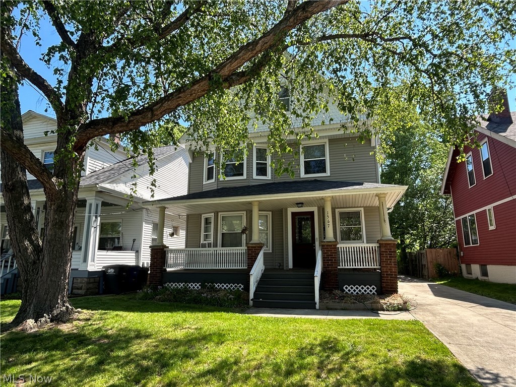 Amazing Lakewood two-family with a beautiful 3rd-floor owner/in-law suite! This home lays out perfectly for an owner-occupant, featuring a completely finished and updated third-floor attic space with skylights, a huge bedroom, full bath, kitchen, large sitting area, and a mini-split for air conditioning. When combined with the second floor, you have up to 4 total bedrooms, 2 full baths, and 2 kitchens. Character and charm abound on the first and second floors, showcasing large room sizes, hardwood floors, gorgeous natural woodwork, original pocket doors, and butler's pantries. Capital improvements and extensive updates include vinyl siding (2017), updated electrical panels/outlets (2015), a newly poured concrete driveway (2015), a 2-car garage (approx. 20 years old), many vinyl replacement windows (2002), and a thoroughly waterproofed basement (2017). Situated in a great western Lakewood location, this charming home is highly walkable to both the Detroit Ave and Madison Ave retail districts, offers easy access to Lakewood Park and the Cleveland Metroparks Rocky River Reservation, and provides a quick commute to downtown, University Circle, and beyond via I-90 and the Lakefront Shoreway—this is an absolute must-see!