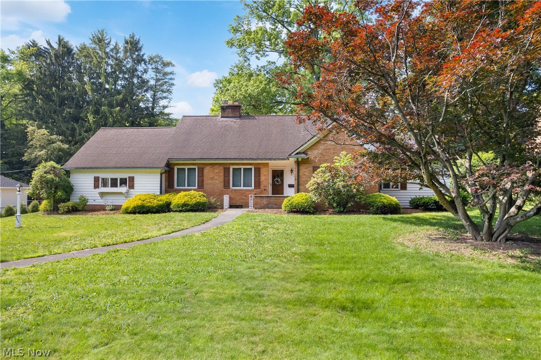 Discover the charm of this beautifully crafted custom home featuring 3 bedrooms and 2.5 bathrooms. The main level welcomes you with a generous living room centered around a cozy wood-burning fireplace, along with a formal dining area, well-appointed kitchen, and a bright library enhanced by a bay window that fills the space with natural light. The primary suite is conveniently located on the first floor and includes a private full bath with a double vanity, two walk-in closets, and a dressing room. Upstairs, you'll find two additional bedrooms, each offering dual closets, as well as a full bathroom and extra attic storage. Enjoy peaceful views of the courtyard from the screened porch or entertain guests in the finished lower level featuring a comfortable den with a second fireplace, distinctive wormy chestnut wall finishes, a wet bar, and a dedicated billiards room. Thoughtfully designed custom built-ins can be found throughout every level of the home. Updates since 2021 include wood flooring on the main level, kitchen flooring, some kitchen appliances, garage door and furnace. This home can be all that you want it to be. Come take a tour today!