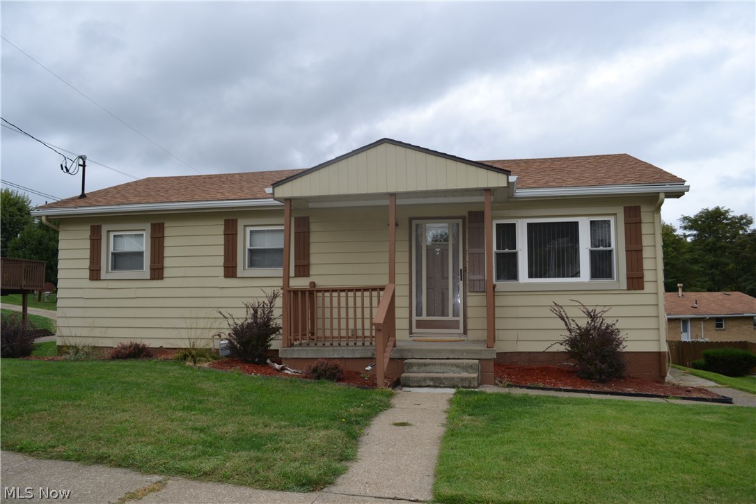 HOME SWEET HOME!  You'll love this 3 BR, 1.5 bath ranch home on Weirton Heights. Beautiful hardwood flooring in the LR and bedrooms. Bright, spacious kitchen and finished recreation room with gas fireplace. Fenced back yard with deck.