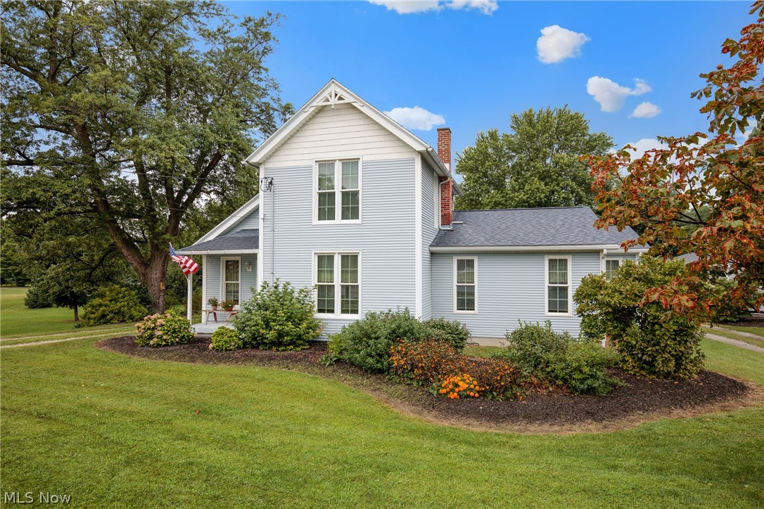 Remodeled century home situated on 14 beautiful acres. 40 X 16 garage, vinyl sided chicken coop and duck cubby. Apple, cherry walnut trees. 24 mature blueberry bushes. Grape, raspberry, seedless blackberry bushes. 4 bedrooms, 3 baths, 2 wood burning stoves, full basement. Furnace 1 year old, newer roof and windows. Make this home your first stop. FREE CABLE, WATER, SEWER, AND TRASH PICK-UP.