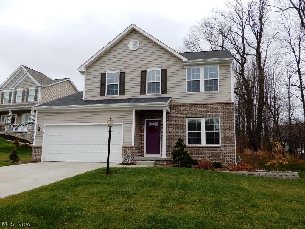 Rare find! - Fabulous newer colonial in the sought after Lexington Farms development! You will love this Florence model, completely spotless and move-in ready.  Modern floor plan features an open eat-in kitchen (all black appliances included!) with slider to the custom built deck.  Private back yard with woods on one side and a nice sized 1/3 acre lot! Relax in the great room which comes with built-in surround speakers (receiver stays!), the first floor is completed with a formal dining (or living) room, 1st floor laundry and 2 car garage.  Upstairs you will find a HUGE master suite w/private bathroom - garden tub and stand up shower, and spacious walk-in closet.  The loft area is perfect for a den/office/study.  There are two other bedrooms and a full bath to finish off the second level.  Basement is neat and clean, and plumbed for another bathroom!  Water softener included.  Don't hesitate, schedule this one today!