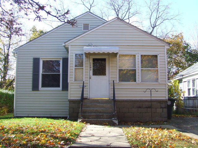 Cute little 2-bedroom Ranch with open floor plan from kitchen to dining room to living room.  Enclosed front porch, full basement.  All appliances stay, including washer and dryer.  Newer windows.  Tiny, fenced backyard.  Just a few finishing touches and could be great starter home, down size, or rental.  Home Warranty.  See it today!