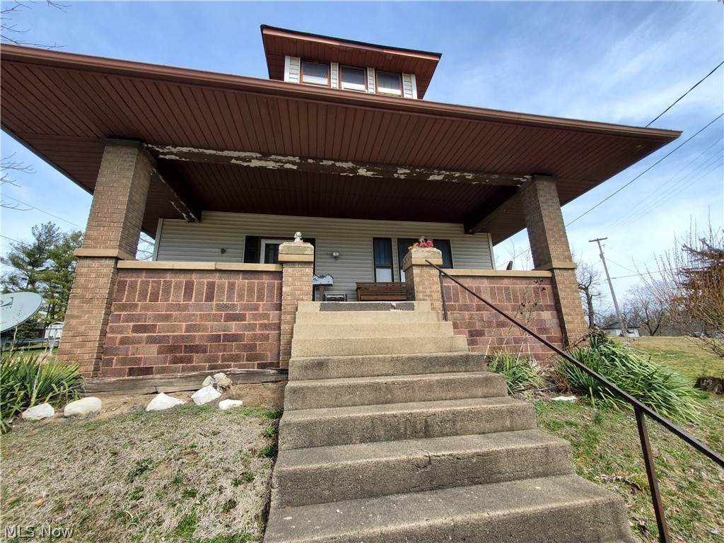 2 car detached garage 24 x 32 built in 1983, w/ electric & heat. AEP electric and Columbia Gas. Rolling Hills LSD. Close to Seneca Lake. With a little TLC this would make great first time home or rental property. Property being sold "as is".