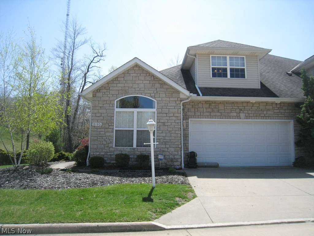 Enjoy maintenance free living at its finest! Don't miss this impeccable 3 bedroom, 2 full bath cluster home with a 2 car attached garage. Featuring a spacious great room with sliding doors that lead to the private yard and patio, which overlooks a green space with panoramic views. The eat-in kitchen includes all appliances and opens to the great room. The master suite is on the 1st floor and offers it own bath. Finishing the 1st floor is a laundry room, a full bath, and 2nd bedroom. The upstairs has a huge loft area that is a 3rd bedroom, or perfect for a playroom or office. This is a very popular end unit!