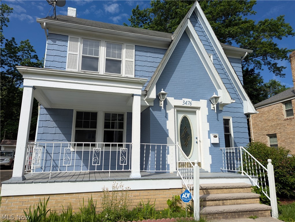 Welcome to 3476 Meadowbrook Blvd, newly renovated, offering modern charm and comfort just minutes from exciting & vibrant Cleveland Hts. Cedar - Lee District.  Freshly painted inside & out, you'll find a beautiful Eat-Kitchen complete with New stainless steel appliances, New cabinetry, New counter-tops & sink and New laminate flooring all coordinated in shades of pleasant ivory, tan & cream.  Entertain family & friends in the Formal Dining Room or just hang out in the generously sized Living Room featuring a wood burning Fireplace.  A Bonus 3-Season Sun Room meets you at the 2nd Fl landing, full of windows & built-in seating where you can enjoy your favorite beverage, watching many days of beautiful sunrises.  Relax & enjoy 3 very generously sized Bedrooms and Full Bathroom with Tub & Shower.  The finished 3rd Floor offers possible space for a 4th Bedroom / Guest Suite which has a Cedar Closet or use as a Home Office or Play Area! Hardwood floors thru out have been refinished.  The Lower Level is partially finished with great space for a Rec Room, bright & airy with ceramic tile flooring & features a Full Bathroom with Stall Shower + adjacent Laundry/storage area.  The front & rear yards are very spacious for relaxing or enjoying fun outdoor games, a 2-car garage with lots of parking plus a fenced-in garden space, great for storage or your new flower or vegetable garden! A New Roof is set to be installed & will complete the package for this move-in ready home.   POS Compliant. Schedule your showing today!