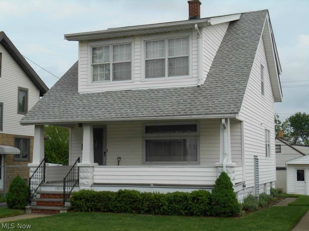 Charming 3 bedroom, 2 bathroom Colonial in the heart of Garfield Heights! Wonderful curb appeal, well maintained exterior, including a newer roof, siding and windows on a beautifully manicured lot. Loads of charm in this cozy home with an abundance of natural woodwork and built in china cabinets in dining room. A lovely living room and dining room with brand new carpet, installed in May 2015. Large eat in kitchen with plenty of counter and cabinet space and natural light. The added panty room leaves space for additional options in the kitchen area-- a must see! Beautiful hardwood floors are in all 3 bedrooms and a brand new carpet is on the stairs. The second floor has 3 roomy bedrooms and a full bath there is plenty of closet space with built-in drawers and storage in the hallway. A second full bath and laundry area with tons of storage space in the basement. A porch on the front of the house that can be a relaxing summer spot for friends and family! detached two car garage in wonderf