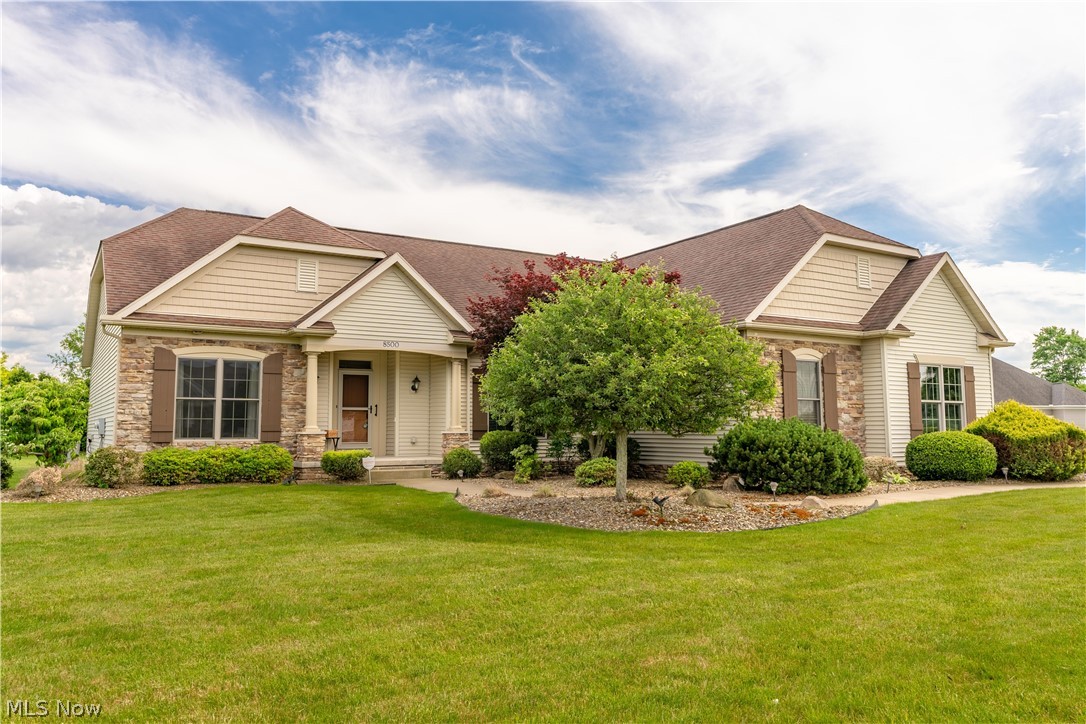 Welcome to this stunning brick ranch on a desirable corner lot in Jackson LSD, offering over 3,600 sq. ft. of beautifully maintained living space designed for both everyday comfort and effortless entertaining. Tucked within a private neighborhood, this home delivers exceptional curb appeal and thoughtful details throughout. Step inside to an impressive great room where vaulted ceilings, a stone fireplace, and oversized windows create a bright and inviting atmosphere. The open layout flows seamlessly into the formal dining room, highlighted by elegant columns that add a touch of sophistication. Just beyond, you’ll find two bedrooms and a full bath, offering a comfortable and functional layout. The eat-in kitchen is both stylish and practical, featuring granite countertops, white cabinetry, stainless steel appliances, a tile backsplash, and a breakfast bar. The adjoining dinette opens to the back deck through glass doors, making indoor-outdoor living a breeze. Step outside to your backyard retreat, complete with a covered deck, patio, fire pit, and green space for relaxing or entertaining. Conveniently located off the kitchen, the spacious primary suite offers a peaceful escape with a walk-in closet and a private ensuite featuring a double vanity, a jetted tub, and a walk-in shower. The main level also includes a half bath, a laundry room, and access to the attached three-car garage. The finished lower level expands your living space with a large rec room, complete with a wet bar and electric fireplace perfect for hosting gatherings. Two additional bedrooms, a full bath, and ample storage space round out this versatile lower level. This exceptional home truly has it all! Schedule your private showing today!