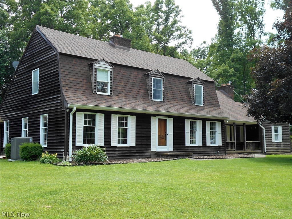 Check out this very spacious, 4 to 5 bedroom, 2.5 bath, Redwood home, situated on over 37 acres in Little Hocking...a rare find, indeed. Recent upgrades made to the home include a new roof in 2015, a new heat pump in 2018 & newer hot water tank. The main level offers formal living & dining rooms, a huge eat-in kitchen with eat-at bar area, 1st-floor laundry & pantry, family room with fireplace, a half bath, & a sunroom. Upstairs offers 4 nice size bedrooms, 2 full bathrooms, and a rec room that could be bedroom #5 if needed. The full, unfinished walk-out basement makes for amazing storage space or workshop area. Outdoor features include a 2 car attached garage, 2 fenced pastures areas, 4 stall horse barn, chicken house, small pig pen, playhouse, fruit trees & grape arbor, and access to the West Branch of the Little Hocking River.  Beautiful land, great privacy, & large home...an amazing property with so many possibilities.