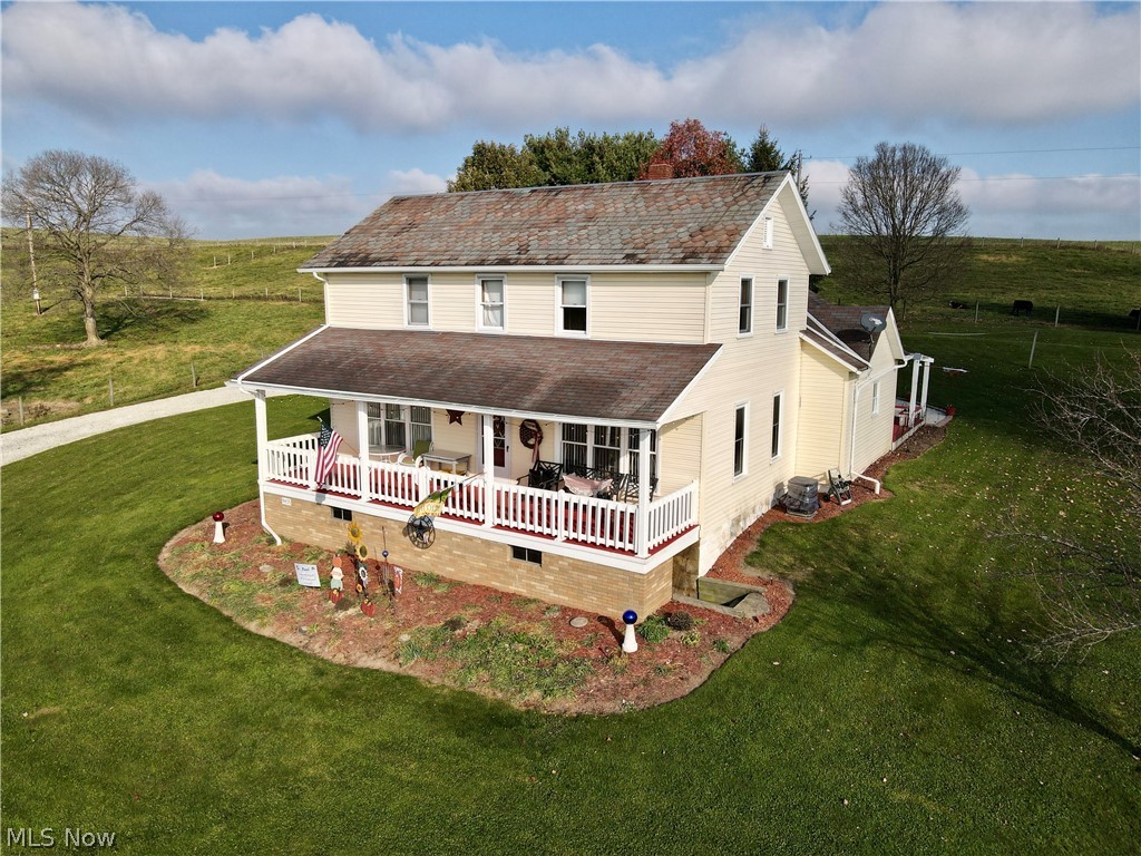 Beautiful Setting! You will love the charm of this 4 bedroom home that has been lovingly cared for over the years! Main level features large living room, dining room, and family room with new laminate throughout.  Eat in kitchen goes out to nice deck overlooking the fields (gazebo will stay).  You will also find a 1st floor laundry and full bath.  Upstairs has 4 good sized bedrooms with the possibility of either 2nd bath or 5th bedroom.  Attached oversized 2 car garage.  Close to town but with room to roam.  Great outdoor living space.  New septic to be installed.  Water softener rented from Culligan for $85 a month