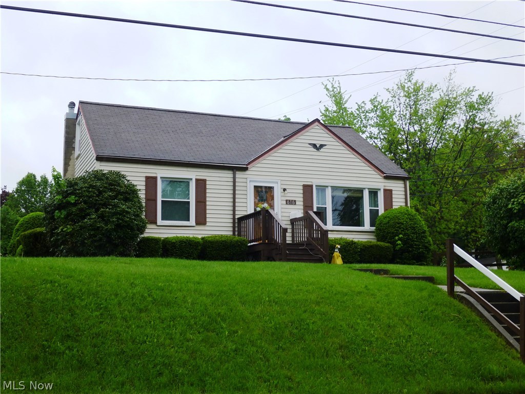 It is the first time on the market for this recently updated 3 bedroom, 1 bath, home! The updates include: refinished hardwood floors in the living room and hallway, new carpeting in both first floor bedrooms, new vinyl floor and new sink, in the eat in kitchen! The bathroom updates include a new tub surround, vanity, and toilet. The exception being the kitchen and sun room, the entire first floor has hardwood floors!  The bright and airy sun room offer three walls of windows and is heated by electric baseboard.  The windows were installed in approx. 2010, (exception/front window), newer living room and sun room doors, and new electric box installed, approx. 2009. There is a LOT of storage space in this cozy home, including LARGE bedroom closets! The basement offers an additional shower, the laundry area, and a one car integral garage featuring a work bench. The furnace and a/c unit have been serviced yearly.  You will be pleased to learn, other than the sun room, the entire first floo