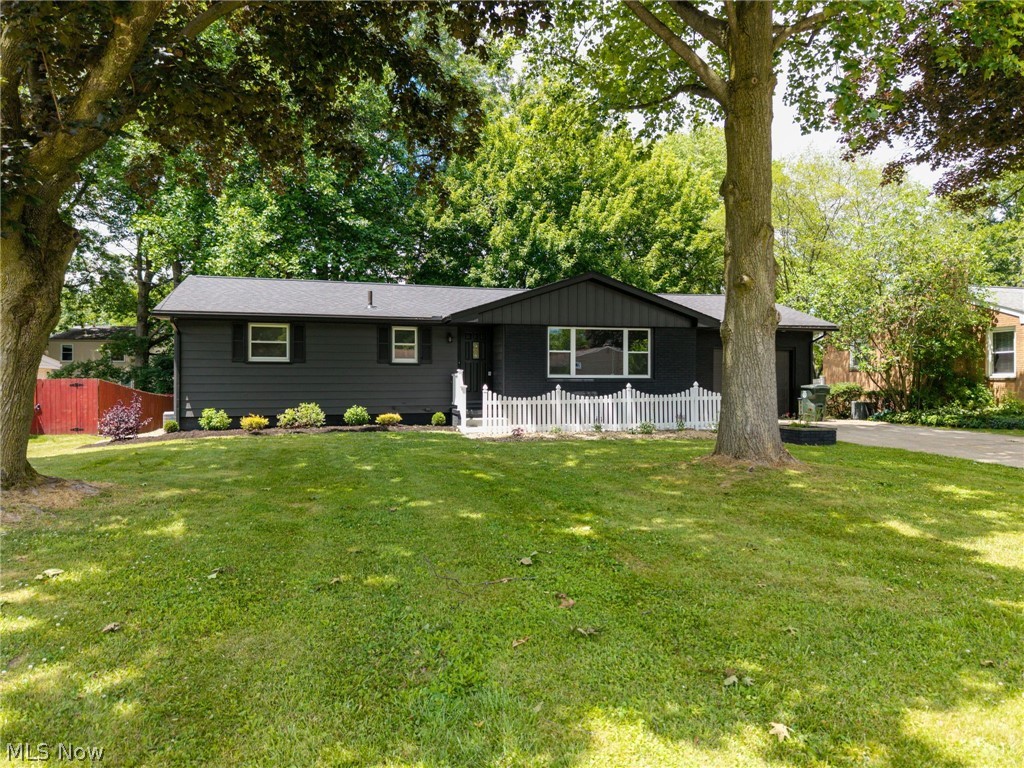 This stunning, move-in-ready ranch offers the prefect blend of comfort, style, and convenience. Featuring three bedrooms, two full baths, and a partially finished basement, this home provides plenty of space for everyday living and entertaining. The beautifully updated interior showcases modern finishes and thoughtful improvements throughout. A spacious two-car garage offers ample storage, while the partially finished lower level adds valuable living space for a recreation room, home office or workout area. Nestled on a gorgeous mature lot with established trees and beautiful surroundings, this property provides peaceful setting while still being close to everyday amenties. Don’t miss the opportunity to make this home your new Home!