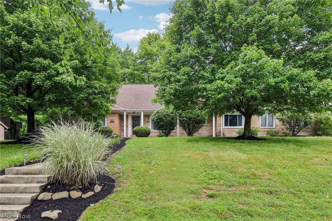 A full home inspection has already been completed and is available upon request. Offers are due by 8:00 pm on July 14. However, buyers should not wait to submit their offer. The seller reserves the right to accept an offer before the deadline. The list price is the starting price. If the seller's reserve price is not met by the deadline, they will call for highest and best offers. Buyers who do not want to risk missing this rare opportunity may secure the property immediately with the $625,000 buy-it-now option and no contingencies. Welcome to this beautiful, mid-century modern home nestled on a serene, .59-acre lot in one of Beachwood's most coveted corners! It is walkable to top-rated schools, the public library, & parks, w/the privacy & quiet you have been searching for. The open floor plan showcases spacious living areas, gleaming hardwood floors, & 3 wood-burning fireplaces. The living room boasts a fireplace, recessed lighting, & backyard access, while the dining room has a large picture window. Prepare culinary delights in the eat-in kitchen, featuring extensive cabinetry, granite counters, SS appliances incl a new Bosch dishwasher (’20)  & gas oven (’23). Retreat to the handsome, first floor office w/direct backyard access. A half bathroom & mudroom, which leads to the garage, are located nearby. Both the first & second floor primary suites offer ample closet space and remodeled, ensuite bathrooms. Two additional bedrooms, sharing a Jack and Jill bathroom, a designated office, and a huge laundry room complete the second level. The partially finished basement offers a fireplace, recreation areas, abundant storage, and room to grow! Unwind on the expansive patio, overlooking the peaceful backyard with mature trees. The attached, two-car garage completes the package. Major updates include new plumbing, ductwork, and a replaced washer and dryer (2018). Located in the prestigious Beachwood City School District, this thoughtfully maintained home truly has it all!