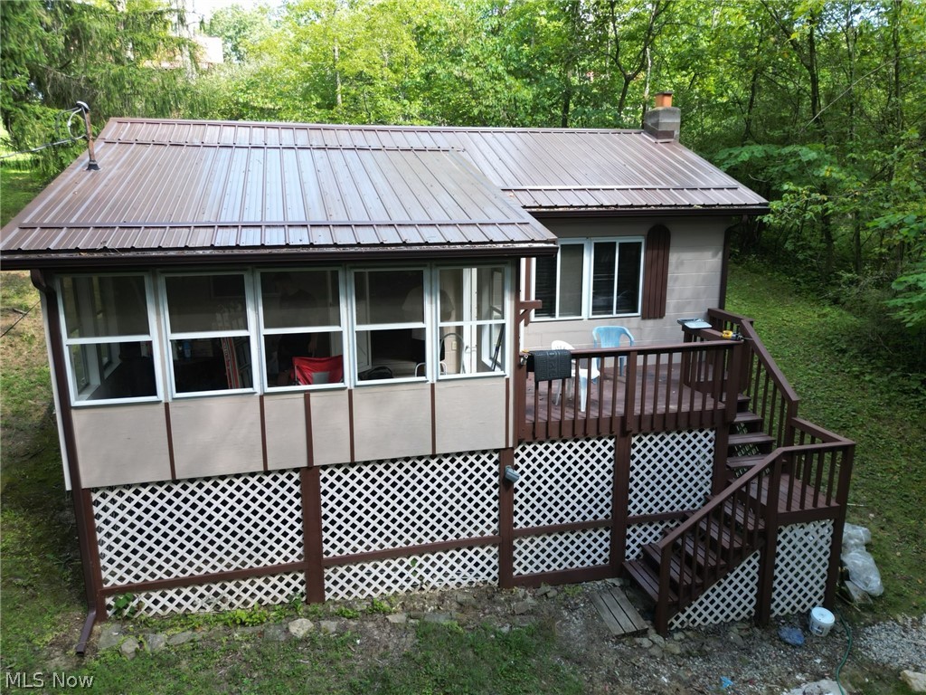Welcome to 34370 Edgewater Park Road! (Also known as Harry Taylor Road). This 2-bed, 1-bath, 1977 build features a bevy of recent upgrades, making this a great option for those looking for the lake life. The list of upgrades completed in 2024 include a new metal roof, new paint throughout, updated plumbing, new flooring, new lighting fixtures, new stairs, and new gravel! Enjoy the peace and serenity of the Piedmont Lake area from your yard, front deck, or screened in porch. The home is located within just a few minutes of both the Reynolds Road Public Boat Launch and from the Edgewater Park Docking Association.