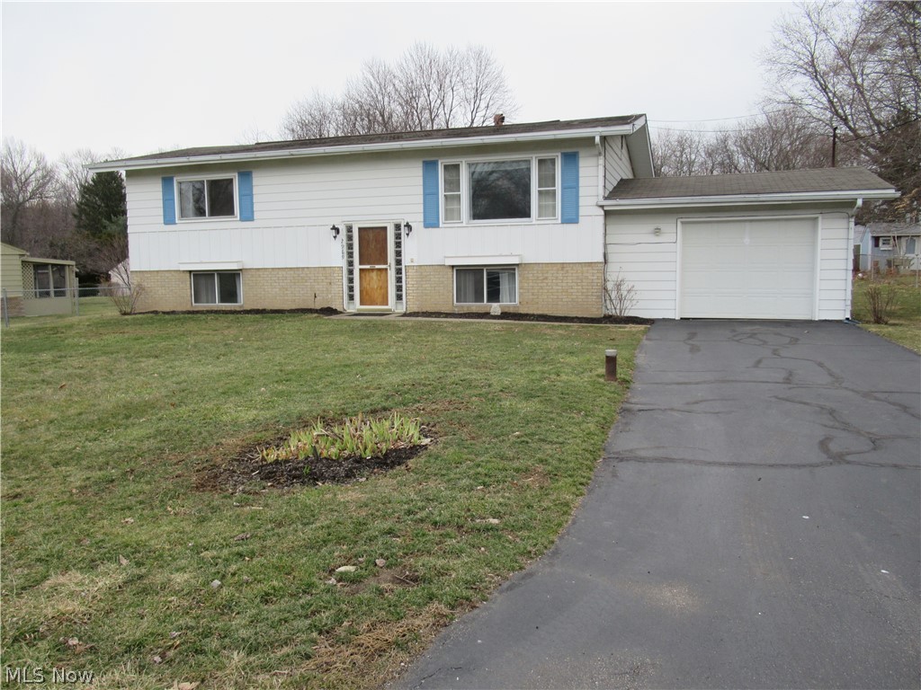 Welcome to this spacious home located in Coventry. This home boasts 4 bedrooms and two full baths. There is a large living room with hardwood flooring. The eat in kitchen opens to the sunroom. There is a second living area in the lower level. Home is situated on a flat lot. Home is in need of some updating and minor repairs. There is over 1,750 square feet of living space. Bring your imagination and make this your new address. Home is being sold AS-IS. Call to schedule your showing today.