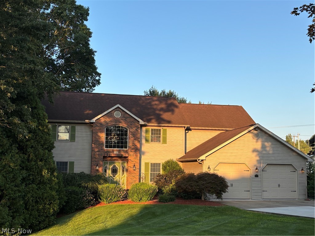 Nestled in one of Cambridge's most desirable neighborhoods, this custom built Edgeworth home offers rare combinations of privacy, generous living space, and everyday convenience.   Surrounded by mature trees and thoughtfully landscaped grounds, the property feels like a peaceful retreat while remaining just minutes from the parks, pool, schools, hospital, and downtown. This 4br. 2 1/2 bath 2 story home with a formal dining room, a spacious cherry kitchen with Corian counter tops and island with sink and pantry and new laminate wood grain flooring on the main floor.  The kitchen has a new cooktop, microwave, dishwasher, and garbage disposal, A 1st floor laundry w/ utility sink and a new washer and dryer, there's also half bath off the kitchen and garage entrance. The solid cherry doors and cabinets throughout the home add quality and distinction to this beautiful home. Enjoy the outside w/ this screened in porch area to sit and drink your morning coffee plus there's a large deck to relax on or cook out with the gas line hookup for a grill. The oversized great room with high ceilings and beautiful windows allowing the sun to flow in is stunning in the morning, and you can sit by the gas fireplace and relax.   With an office to work from home, and living room at the entrance you have so much space to enjoy.  There's the oversized master suite upstairs with a huge walk in closet with built in shelves and jetted tub and walk in shower, plus 3 other large bedrooms for you to enjoy.  The full walkout basement is an open canvas if you want to finish it, it currently has a putting green that stays for those golf lovers and ample storage area. Home also comes with a 2 car attached garage with new openers and ample storage and paved driveway with off street parking and basketball hoop. There's  a security system,  new gas furnace and central air,  new gas fireplace log set, new outside lights. Freshly painted interior.  Home Warranty with America's Preferred $499