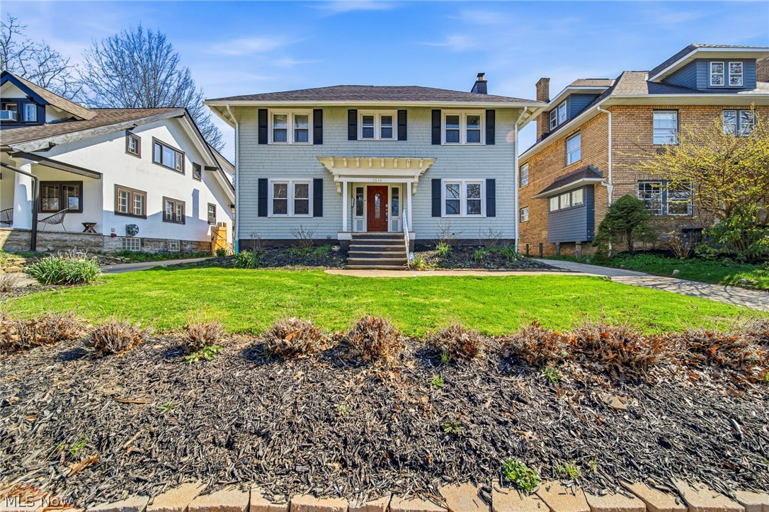 Stunning Coventry Village Center Hall—fully renovated top to bottom in 2022! Bright, sun-filled interiors throughout. The spacious living room features a tiled fireplace with a custom mantle and opens to a newly screened covered porch, perfect for warm evenings. The open dining room with distinctive moldings connects to a new kitchen with granite counters, white cabinetry, an island, and stainless-steel appliances. Upstairs, the primary suite includes a private bath with double sinks and a tiled shower. Two more bedrooms—one with porch access—and a renovated full bath complete the second floor. The third floor offers a skylit suite with a private bath, ideal for guests or a second primary. Major updates done in 2021/2022: new windows, roof, gutters, furnace, central air, plumbing, electrical, and waterproofed basement. New Hot water tank (26) 2-car garage added drywall (22). The driveway was expanded (23). Fenced-in play area (23). Just move in and unpack!
