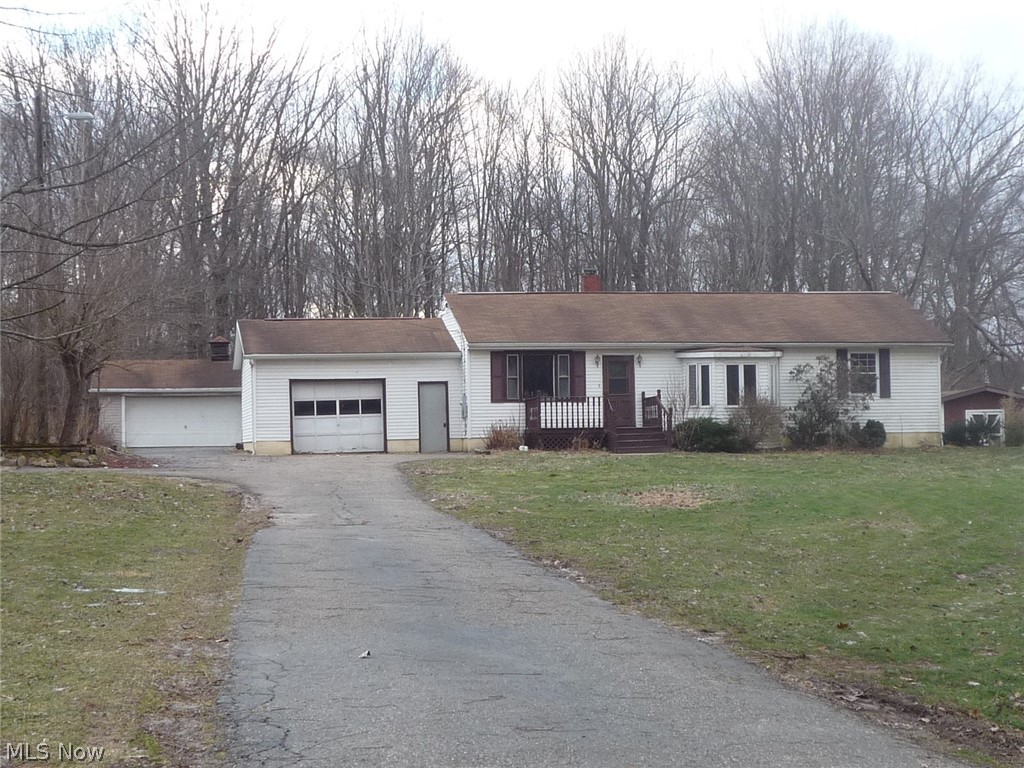 3 BR Rootstown Ranch.  First floor Family Room and First floor laundry room.  Living and Dining Rooms.  Attached oversized 1 car garage, and detached 2 car pole barn garage.  Great value in Rootstown!  This is a Fannie Mae HomePath Property.