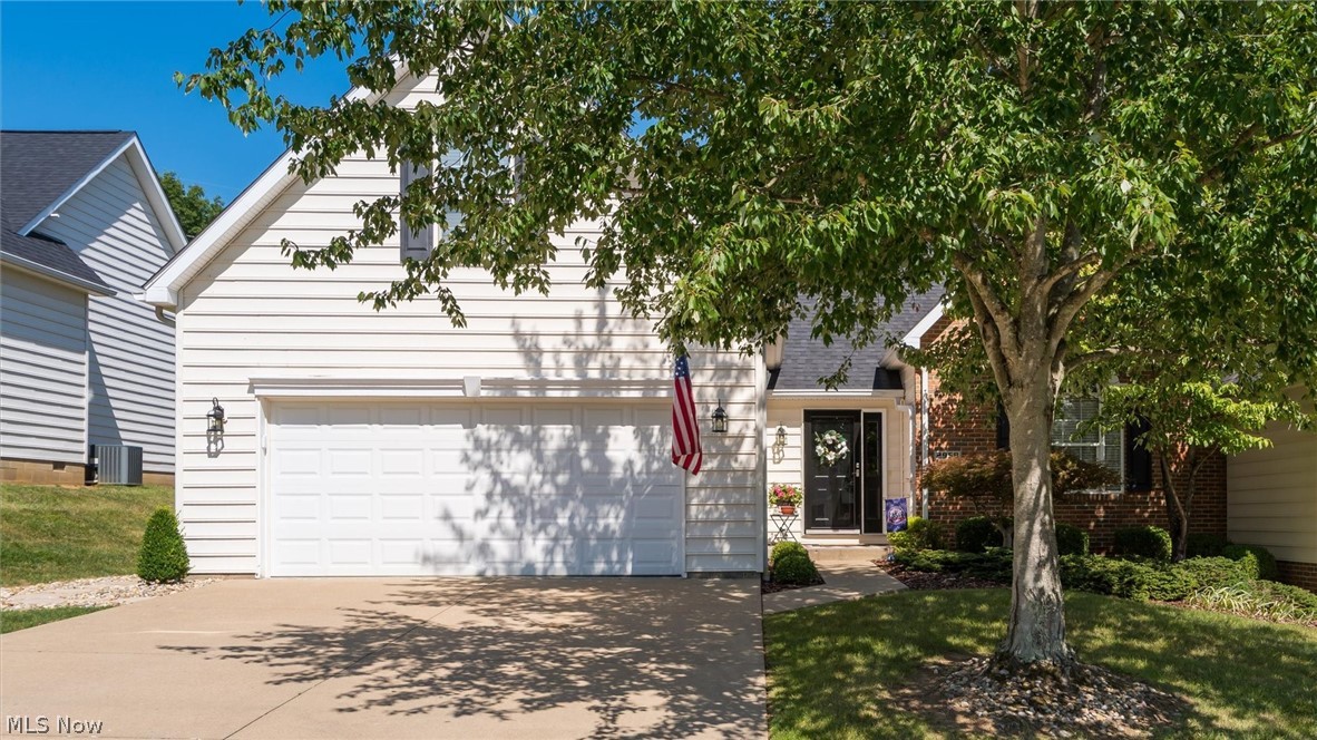 Experience elevated living in this beautifully updated three-bedroom, three- bath condo,perfectly designed for comfort, style, and entertaining. From the moment you step inside, you're greeted by warm natural light, wonderful upgrades, and inviting spaces that make the home truly stand out. The storm door, front door and glass sidelight has just recently been installed. The open-concept main level features a spacious living room. The sunroom is a standout feature-ideal for morning coffee, plant lovers or the perfect game room. The owner just installed a new door and sunroom windows. Step outside to the two tier deck. Perfect space for grilling, relaxing, or hosting a summer party. This outdoor space offers views of the new landscaping and has steps that walk down to the new stepping stones that lead to the front of the home. The new kitchen boasts modern updates; stainless steel appliances that includes a gas stove for the chef of the home, Corian counters and backsplash, stainless sink, under counter lighting and a breakfast bar. The dining area is open to the kitchen for convenience. The laundry room is in between the kitchen and the two-car garage. The washer/dryer will convey with the sale of the home. The garage has a utility closet that holds the furnace, hot water tank and the new water softener. There is a a brand new garage door opener along with a sink and three additional storage closets. There are two bedrooms on the first level. The Primary bedroom is very generous with space and has a large walk in closet. The Primary bathroom features a walk in shower, all new fixtures and a new toilet. The guest bedroom on the first floor features a private full bath with shower/tub combo with new fixtures and new toilet. The upper level has a large bedroom with a walk in closet, 2 smaller closets and a skylight. The private bath features a walk in shower, new fixtures and new toilet. The home features updated flooring, interior paint, window blinds and ceiling fans.