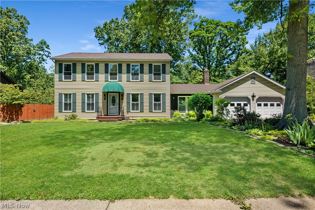 Welcome home to this beautifully maintained 4-bedroom, 3-bath Colonial in one of Stow’s most desirable locations. Set on a landscaped lot with excellent curb appeal and well-kept flower beds, this home makes a memorable first impression.

Inside, you’ll find a spacious, functional floor plan filled with natural light. The formal dining room opens to a modern kitchen with white cabinetry, granite countertops, a built-in range top, and a full appliance package—ideal for everyday living and entertaining.

The home offers two generous living areas. One features built-in cabinetry, a brick fireplace, and a wet bar, creating a great space for gatherings or a recreation room. The second living area provides a comfortable retreat and is perfect for a media room, playroom, or additional family space.

Additional highlights include first-floor laundry and a bright sunroom with skylights, offering a relaxing spot to enjoy backyard views year-round. The Home also features a heated 2-car Attached garage.

The owner’s suite is a true standout, featuring a spacious walk-in closet plus two additional his/hers closets and a stunning en-suite bath. Enjoy dual vanities, a tandem shower with dual shower heads, a jetted soaking tub, a toilet and bidet combination, cathedral ceilings with skylights, and private access to a balcony overlooking the backyard.

Three additional bedrooms offer flexibility for family, guests, a home office, or nursery space.

Outside, the backyard is designed for enjoyment with a patio, hot tub, fire pit, storage shed, and peaceful views—perfect for entertaining or unwinding at the end of the day.

Conveniently located near shopping, dining, parks, recreation, golf courses, major highways, and highly rated Stow schools, this exceptional Colonial combines comfort, space, and convenience in one impressive package. Don’t miss your chance to make it yours.