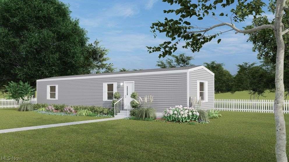 Gorgeous brand new Clayton mobile home with 2 year warranty on all systems. Serene safe community all ages welcome. Brand new Clayton mobile home offers 2 bedrooms and 2 full baths.  This home is beautifully crafted  and designed for comfort, style, and value. With an open floor plan, modern kitchen, spacious living areas, and energy-efficient construction, it’s the perfect place to call your own.  The home offers a gourmet kitchen with an island , designer wooden cabinets, and upgraded appliances to include a gas stove, dishwasher and refrigerator.  Exquisite grey wooden plank vinyl flooring T/O add to the light and bright design of this beautifully adorned home. Two master suites offer privacy and space for everyone!  Other features include separate laundry room , walk in closets and large front porch. Perfect location to walk to shops and restaurants.