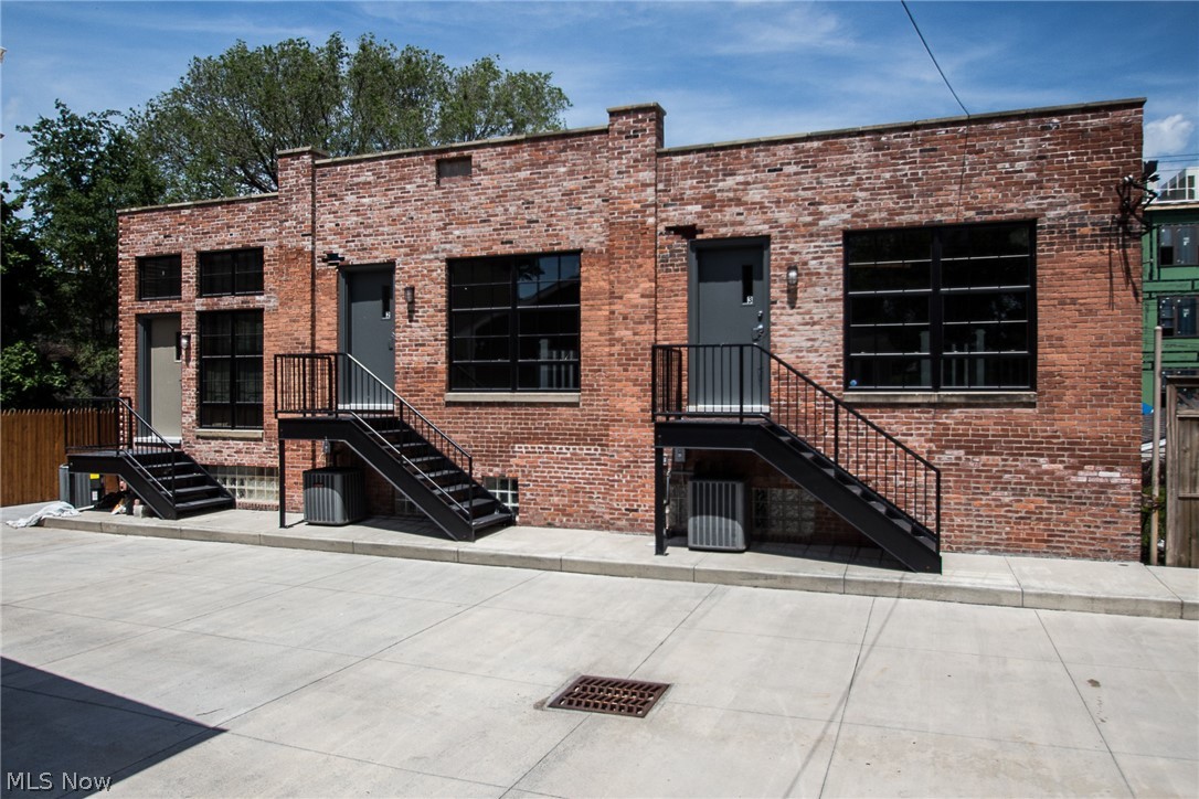 Available for occupancy in July and 2 attached garage spots included in price!! 2 bedroom, 2.5 bathroom with in-unit laundry in this incredibly renovated "Franklin Flat"! Live, work AND play in this incredible pad in the Hingetown neighborhood of Ohio City. Nestled in just footsteps from Rising Star Coffee, CLE Museum of Art's Transformer Station, JukeBox and more. 1800 square foot of living space offers it all! Highlighted by exposed brick, rustic hardwood floors, beautiful wood beams and high end finishes. Entertain in the open concept floor plan with skylight feature and stainless appliances. Main floor laundry for your convenience. Storage galore with walk-in closets in both bedrooms. 2.5 bathrooms!! Never worry about street parking with the attached private 2-car garage INCLUDED in price. Lower level with soaring ceilings is an open canvas for one's needs. Turn it into a work space or make it your family and entertainment room! Possibilities are endless. Pets are negotiable. Call