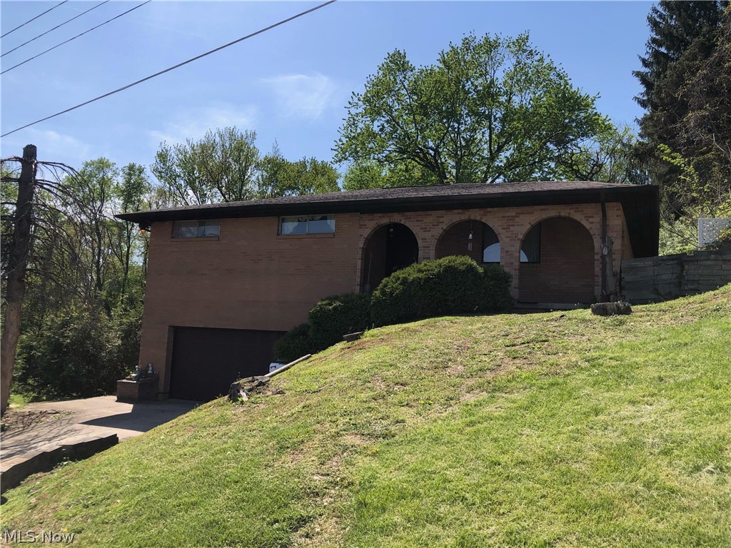 Bring your ideas and talent and transform  this potentially great home back to it's former beauty.Furnace 2014, water heater approx 2 years old, roof 18 years.
 Hardwood floors that will need refinished. Backyard is flat and private. If you need more yard there is an adjoining parcel 50.4 x 150. available for purchase at $25,000.