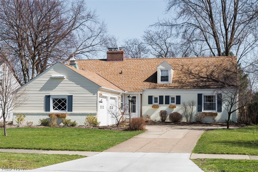 Located in the sought-after Rocky River School district and placed on over 1/4 acres, this 5 bedroom 2.5 bath cape cod delivers wonderful space both indoors and out! Recently updated eat-in kitchen features painted cabinets, granite countertops, tile backsplash, and stainless steel appliances. Move to the formal dining room with gorgeous wood floors that flow through the main areas of the home. The spacious living room is situated around a stylish fireplace with built-ins. Walk through the patio door and enjoy the outdoor view from the four seasons room. Three generous bedrooms complete the first floor and two bedrooms on the second level give plenty of space for everyone. All bathrooms have been recently updated with newer tile, vanities, fixtures and lighting. Downstairs a partially finished basement with fireplace allows for more casual entertaining. The oversized fenced in backyard gives plenty of space to play and entertain. Two-car courtyard garage. Mostly newer windows, newer fu