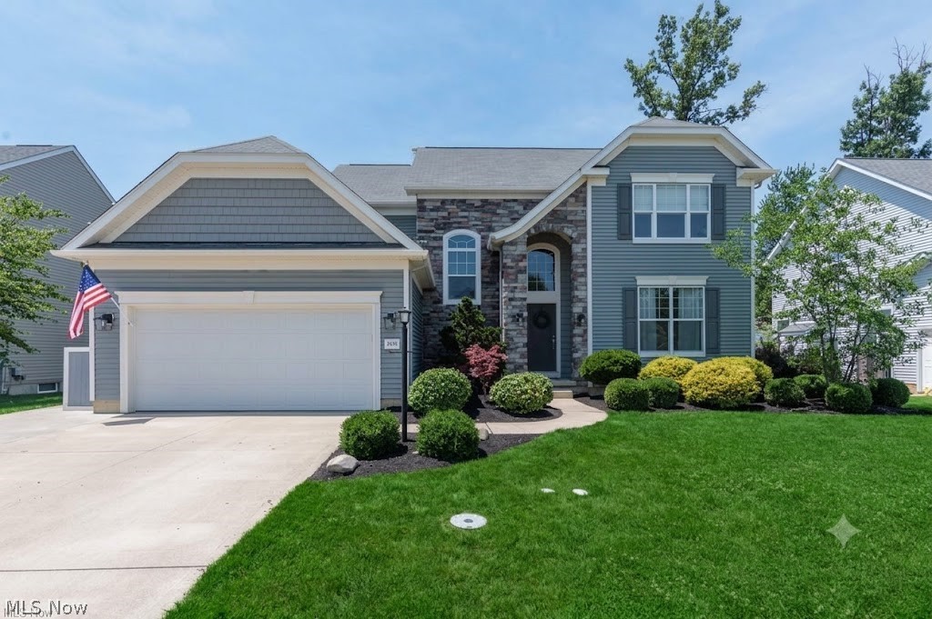 Exceptional looking Colonial in Avon’s Stonebridge Creek neighborhood! The main floor features a versatile living room/home office, formal dining room, dedicated laundry, and a half bath. The open-concept kitchen includes a center island, stainless steel appliances, and a bright morning room with direct access to the back patio. The adjacent family room features a cozy gas fireplace.

Upstairs are 4 bedrooms and 2 full baths, including an owner's suite with a large walk-in closet, soaking tub, and stand-alone shower. The remaining secondary bedrooms feature custom built-in closet shelving. The fully finished lower level adds substantial living space, featuring a massive recreation room, custom bar area, an additional family/media room, and a private 5th bedroom with a full bath. Residents enjoy community amenities including a pool, clubhouse, and playground, all just minutes from top-rated Avon schools, shopping, and dining.