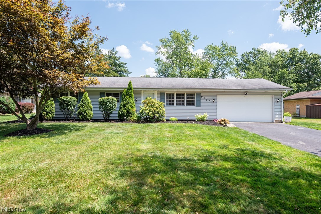 Completely updated one floor living in Macedonia! This fully renovated and well maintained home offers open floor plan living with a stunning remodeled kitchen with stainless appliances and a walk in pantry. Sunny living room opens to the dining area with sliders out to the charming back yard. Remodeled full bath down the hall with 3 generously sized bedrooms.  Primary bedroom with ample closet space and a full private en suite bath!  Mudroom/laundry/drop zone connects the attached garage to the kitchen, great for busy modern living!  Outside you'll enjoy an extra large almost half acre lot, perfect for entertaining with a sprawling patio and fire pit.  Thoughtful mature landscaping and a large shed for storage. This home is absolutely move in ready! Furnace, A/C, tankless hot water, LVT floors, carpet, kitchen, bath and laundry all renovated in 2017. Kitchen appliances all 2017 and washer and dryer new in 2020. Smart Garage door.