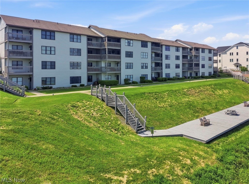 Welcome to lakefront living at its finest in the highly desirable Saybrook Beach Club! Located on the lake side, this first floor, has 2 bedrooms, 1.5 bathrooms, has been beautifully updated & maintained and offers one of the best views of Lake Erie, enjoy right from the comfort of your living room. Wake up to breathtaking sunrises and unwind with spectacular sunsets in your own lakeside retreat. This unit comes fully furnished & will make a perfect vacation, investment or year-round residence. Enjoy the convenience of all appliances included, featuring a stackable washer & dryer for easy everyday living. Updates include new Kraftmade cabinetry in the kitchen & bathrooms, newer wood plank flooring, new Pella windows, new shades, plus a new screen and entrance door, blending comfort, style, and efficiency. Enjoy resort-style amenities including a community pool, clubhouse, and private beach access, perfect for soaking up the best of summer on Lake Erie. Ideally located just minutes from the charm of Historic Bridge Street, wineries, restaurants, shopping, and the excitement of Geneva-on-the-Lake, this exceptional condo offers the perfect blend of relaxation, convenience, and waterfront lifestyle. Don’t miss your chance to own a slice of Lake Erie paradise!