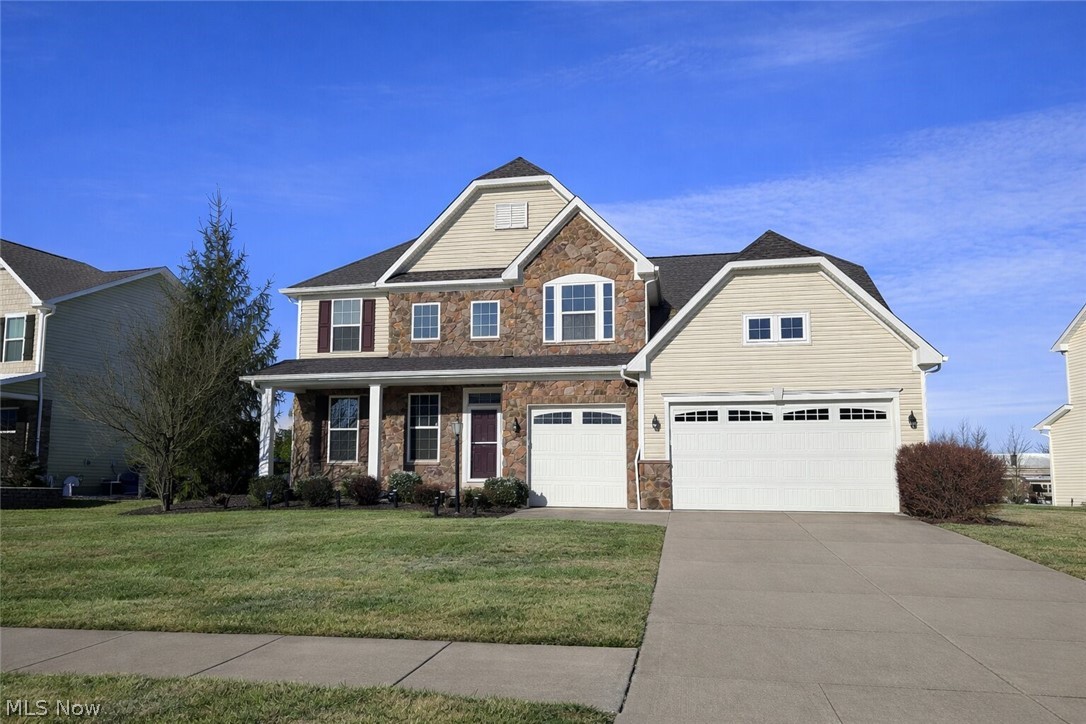 Searching for a 5-bed home in Hudson that blends refined design, generous scale, and
thoughtful upgrades? This beautifully appointed 2014 residence offers 4,661 finished
square feet, delivering a seamless balance of comfort and sophistication. The main
level showcases an open concept design anchored by a spacious eat-in kitchen with
granite countertops, abundant cabinetry, and effortless flow into the expansive living
room, highlighted by a gas fireplace. A formal dining room or sitting area creates an
elegant first impression, while a main level bedroom with a full bath offers flexibility for
guests or extended living. Upstairs, four generously sized bedrooms each feature walk-
in closets, complemented by the convenience of second floor laundry. The primary suite
is a true retreat, offering exceptional scale, dual walk-in closets, and a spa-inspired bath
with dual vanities, an oversized walk-in shower with dual shower heads, and a private
water closet. An additional full bath with a double vanity serves the upper level. The
finished lower level adds approximately 1,200 square feet of versatile living space,
including a bonus room ideal for a sixth bedroom, fitness studio, or media space.
Outdoor living is equally impressive, featuring a covered patio with a hot tub that opens
to a stone patio and private backyard setting designed for both relaxation and
entertaining. Additional highlights include a 3 car garage, brand new furnace, and
recently inspected electrical. Set on a 0.30 acre lot, this home offers a rare combination
of space, function, and elevated living. Schedule your private showing today.