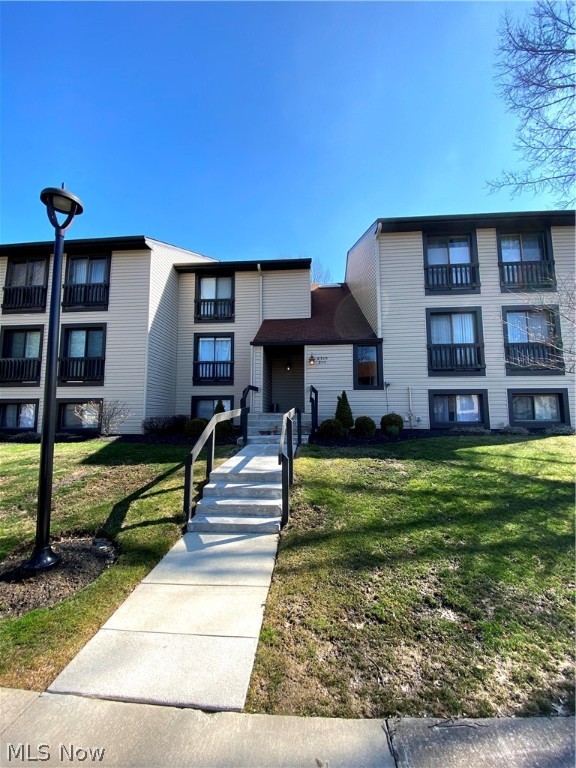 Impeccably maintained Oak Knolls condo, private views from this 3rd floor condo.  One-floor living, move in ready.  Laminate flooring in living room and kitchen  for easy maintenance and cleaning.  Kitchen features plenty of cabinets and counter space, plus all appliances convey.  Enjoy the wonderful cross breeze as you relax eating dinner in the dining room or in the living room.  The private deck overlooks the large green space to the rear and not one other unit looks directly on this unit - privacy!  The unit features 2 bedrooms and 2 full bath.  Spacious master bedroom with walk-in closet and en-suite bath.  Fantastic location, centrally location between Cleveland and Akron, closet to shopping, highways and parks.  This wonderful condo complex also offers great amenities: indoor & outdoor pool (3 pools total), fitness room, community room, tennis courts, pond- all in a beautiful wooded setting.  No in-suite laundry.  Garage #99.