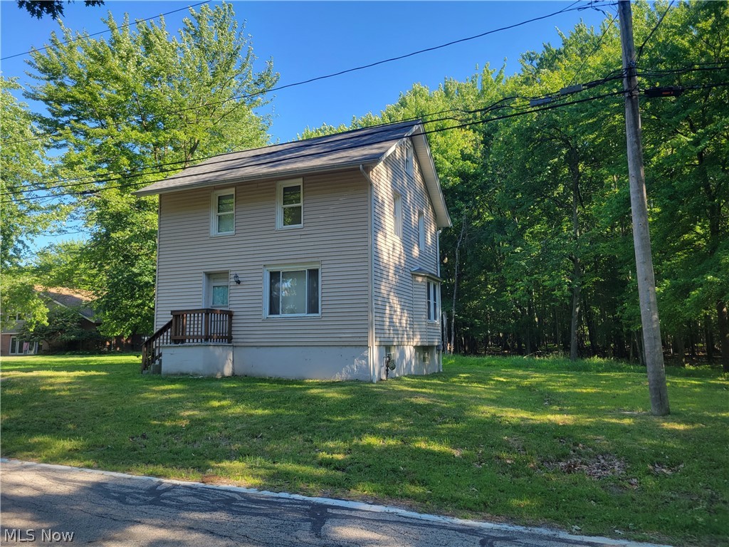 This Unbelievable gem sits on 4.4 acres nestled away on a cul da sac with mature trees near the metro parks. 
The Sale of this property includes the rear lot, parcel#. 662-05-008. The total property has 200ft of frontage and can be divided and built on. The house has 3 bedrooms and two additional rooms in the walk up attic but not livable.