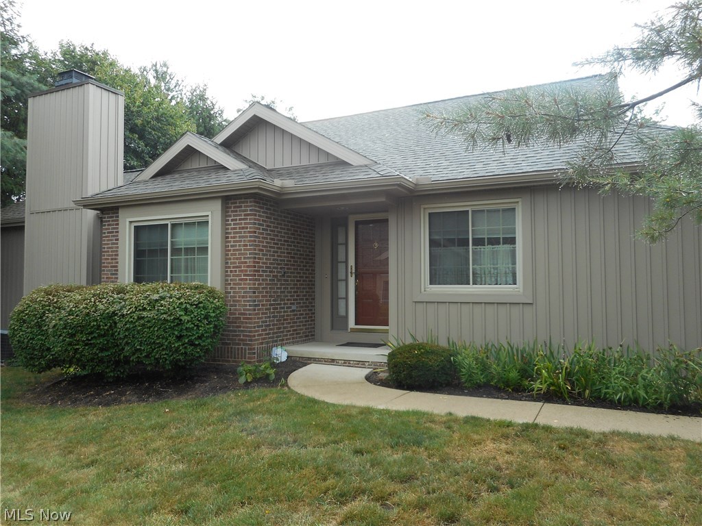 Fantastic first floor living in Robin Ridge!  Open floor plan -- vaulted ceiling and fireplace in spacious great room.   Updated eat in kitchen features newer backsplash, corian countertops, laminate flooring and stainless steel appliances.  Master suite offers 8 x 8 walk in closet, updated full bath  with corian vanity and tiled walk in shower and 6 additional side jets!  Second bedroom offers nice closet space as well.  The lower level is finished with gas fireplace, hot tub, full bath and 2 rooms for storage and/or a workshop area.  Enjoy the private backyard without having to mow from  your composite deck.  Nature stone in garage and sink for gardening.  Newer windows, roof, siding and hot water tank, & carpeting.  Home warranty provided for peace of mind.