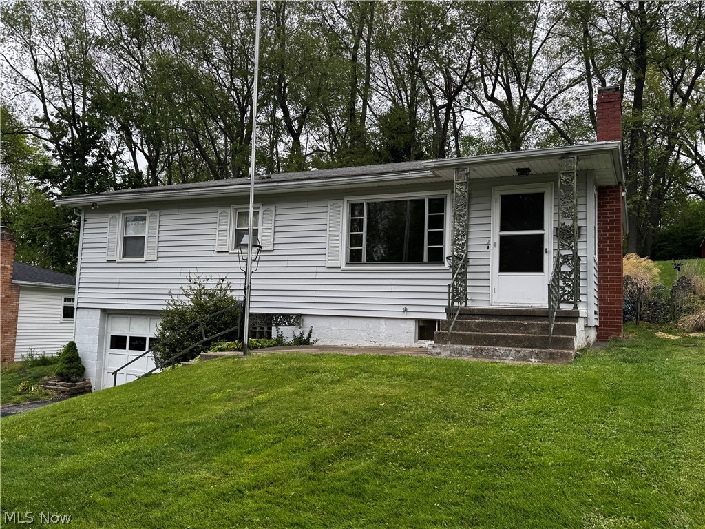 I love the backyard with all its trees, bringing nature to this charming 3 bedroom, 1 bathroom home in Wooster.  Whether you are looking to lay roots or an investment opportunity, this home checks all the boxes.  First floor features hardwood floors in majority of the rooms.  Country style dine-in kitchen that leads to back patio, perfect place for summer entertaining.  Block window is idea for letting all the natural light in while adding a little extra privacy.  Living room with beautiful stone fireplace.  All the bedrooms of decent size closets.  1 Car attached garage.  Recreational room in the basement, as well as laundry room.  All of this on 0.2818-acre city lot.  Gas Water Heater: 2024.