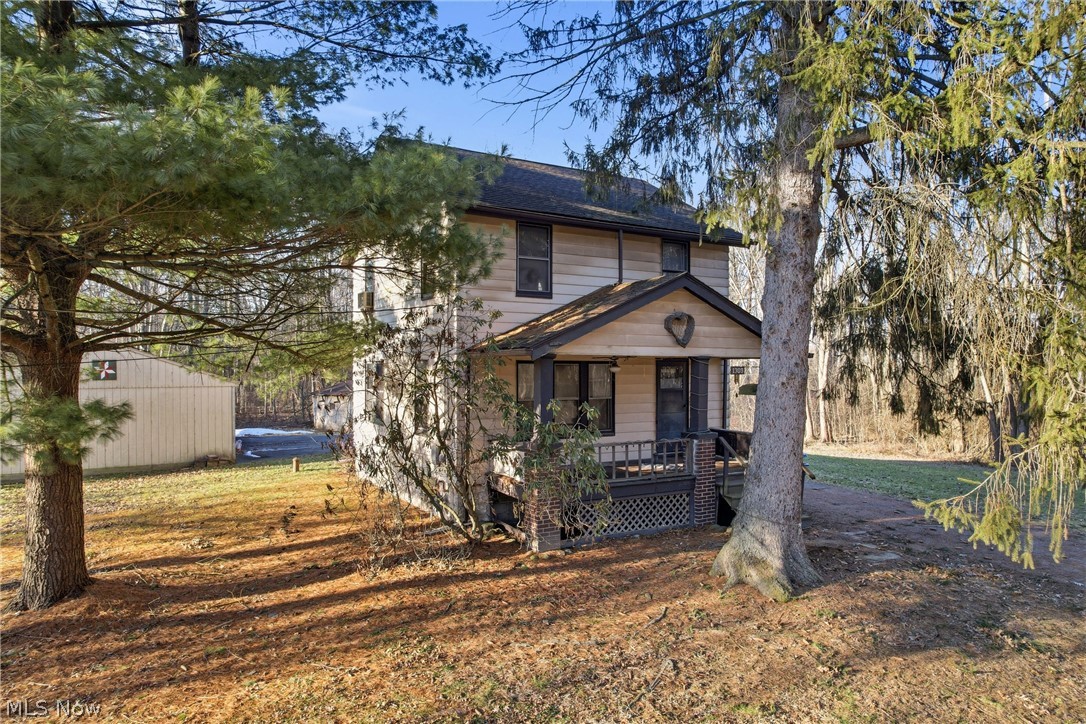 Looking for privacy and plenty of room to work on all your projects? This Weathersfield Township property is the one for you. With solid bones, this home offers the perfect opportunity to add your personal touch. The home features three comfortable bedrooms and one full bathroom, along with a full basement that provides additional storage or potential workshop space. Car enthusiasts, hobbyists, and DIYers will love the expansive outbuildings: a newer oversized two-car garage complete with heat and electricity, an additional carport, and two large sheds—ideal for tools, equipment, or extra storage. Updates include a brand new furnace in 2026 and updated plumbing. Situated on a wooded corner lot, the property offers a blend of privacy and convenience, with quick access to major highways, shopping, and more. Located in the Niles School District, this home is a fantastic option for anyone looking for space, flexibility, and value.