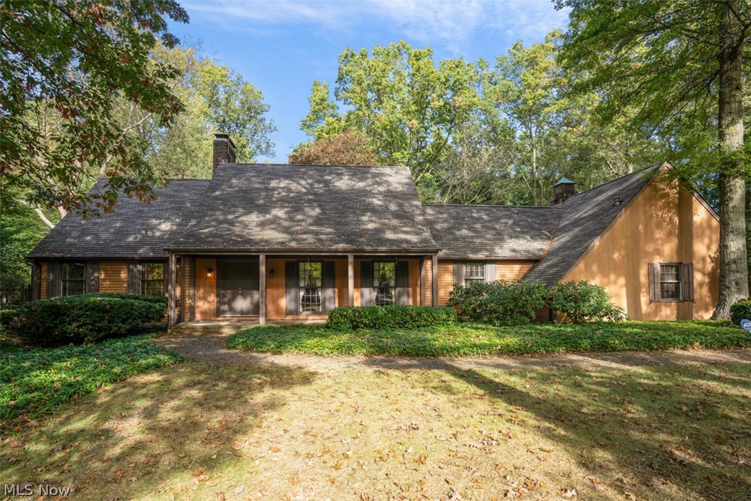 Custom built 4/5 bedroom cape cod situated in the park-like setting cul-de-sac of Quail Hollow in Hunters Woods.  Character and charm describes this wonderful home.  Master bedroom located on the 1st floor with 2 walk-in closets and fireplace.  Family room features fireplace and wall of windows to view the private backyard.  Updated kitchen with granite counters adds to this homes appeal.  Also on the 1st floor is an office, screened porch and large 1st floor laundry room. The office can be converted to become a 5th bedroom.   Lower level rec room has a bar and pool table perfect for entertaining.  Come take a tour!