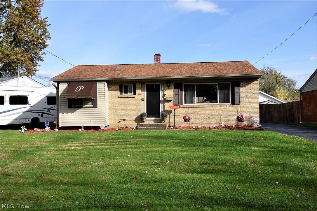 Come take a look at this adorable 2-3 bedroom 1 1/2 bath Austintown ranch!  You will love spending time in the 4 season room that was recently added overlooking the well manicured backyard!  This home features a walk in tub with shower to soak away those aches and pains!  Are you a techie?!?  The bathroom light/fan is equipped with blue tooth so you can enjoy your favorite music while taking a hot bath! The rec room, office, craft room and newer 1/2 bath in the waterproofed basement provide plenty of extra living space!  The rec room features a bar with multi colored flashing lights and a custom made wine rack.  When the weather is nicer you can enjoy spending time on the deck.  If you're adventurous you can grill out there all winter long!   The 2 1/2 car garage provides plenty of space for parking and lawn equipment.  Don't wait too long to call for a private showing!  Basement waterproofed by Ohio Waterproofing and has a transferable warranty.  Furnace 5 years old, Roof 16 years, HW