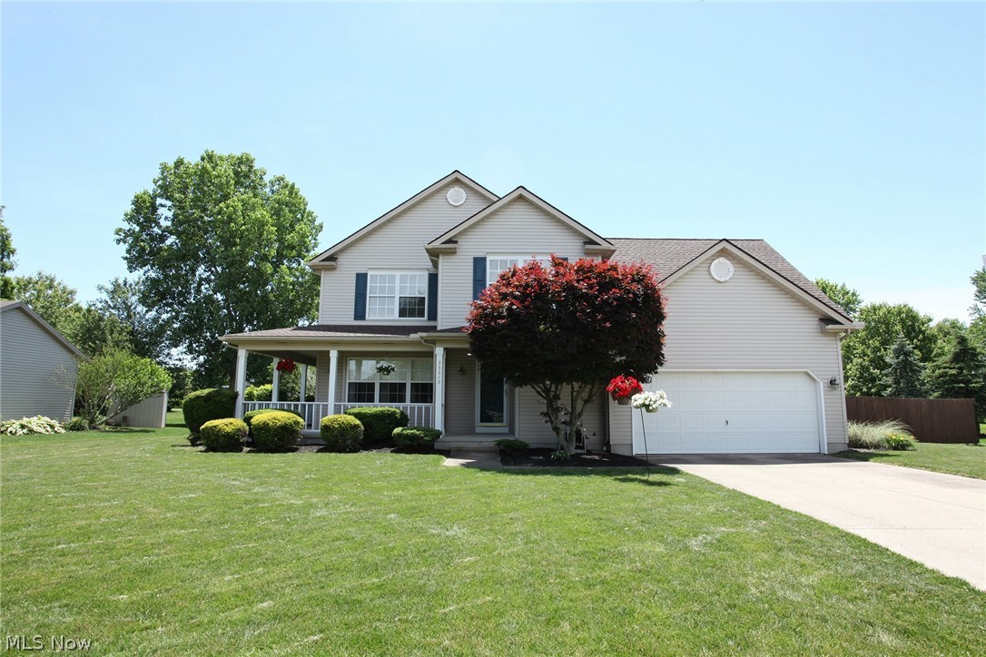 Welcome home to this very well built 4 Bedroom home in Avon!! A beautiful wrap around porch greets your guests and adds so much charm. The open foyer is inviting with wood floors. The formal dining room (or flex space) has new carpeting. The great room is open with a beautiful stone gas fireplace for all of our winter snuggling. There is also a door that leads to the wrap around porch. The open kitchen offers newer stainless steel appliances that stay with the home.  The eat-in kitchen area has a slider the leads to the deck with a pergola, a fully fenced large yard with a shed. The 1st floor is complemented with a 1st floor laundry. Upstairs offers 4 large bedrooms. The master bedroom has a vaulted ceiling and master bathroom with a stand up shower and plenty of counter space.  The basement is partially finished with new carpeting and there is still room for storage in the unfinished parts. The roof is 5 years old, furnace and AC were replaced last year (2017), new sump pump this year